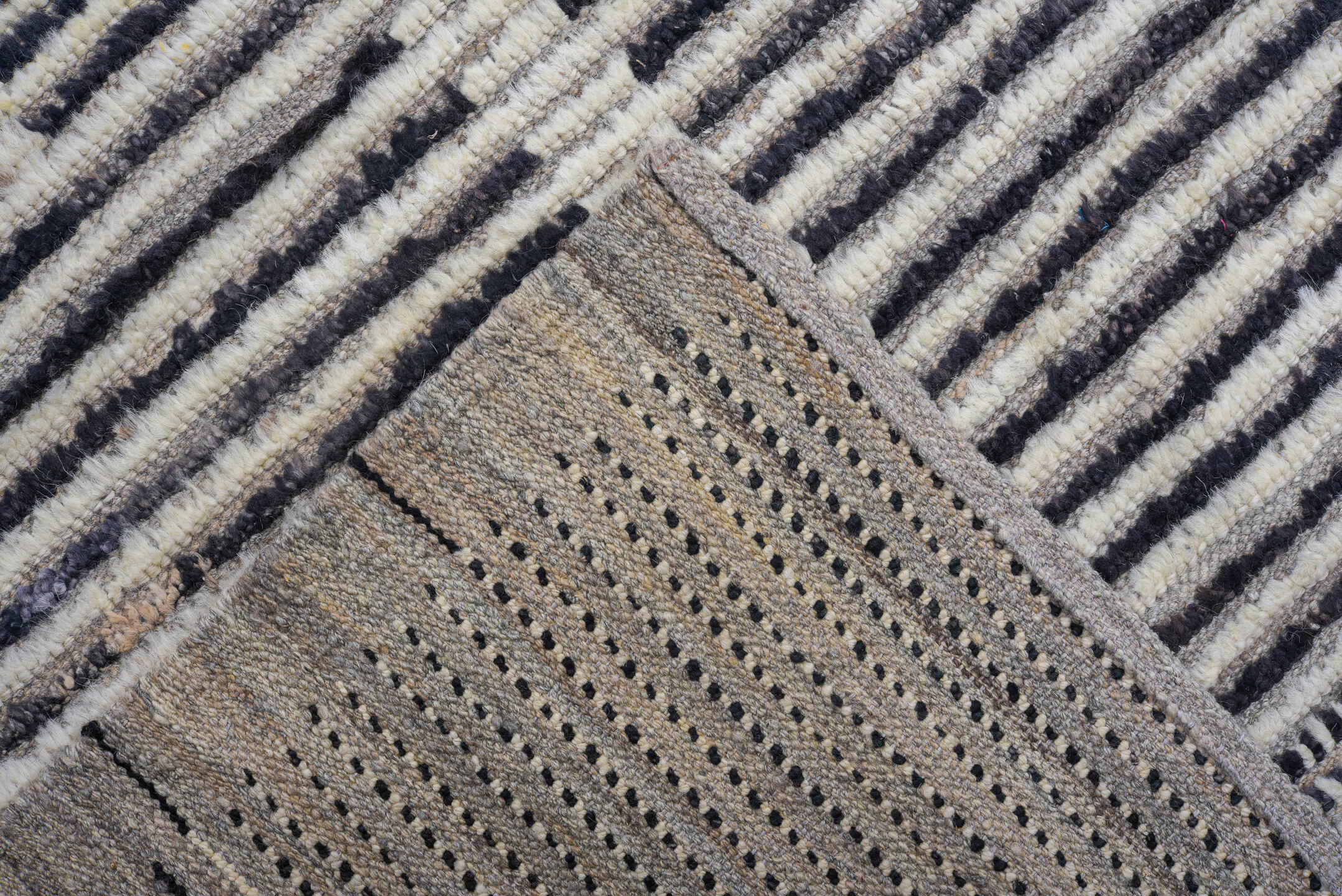 9' x 12' one-of-a-kind handmade vintage Tulu large size rug. Color palette: charcoal, ivory, gray, black