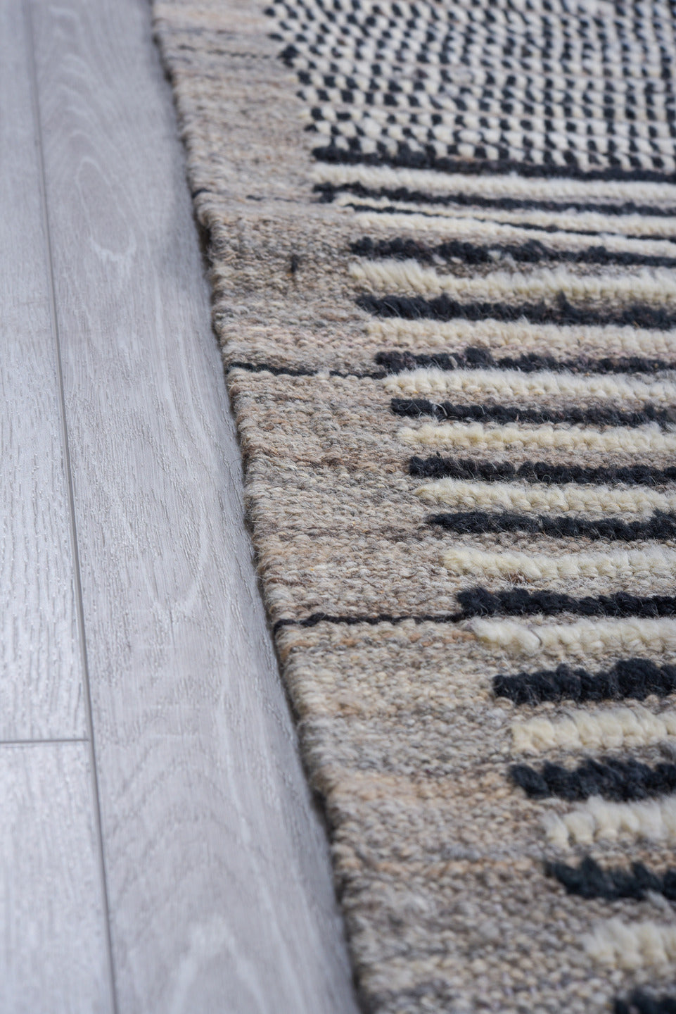 9' x 12' one-of-a-kind handmade vintage Tulu large size rug. Color palette: charcoal, ivory, gray, black