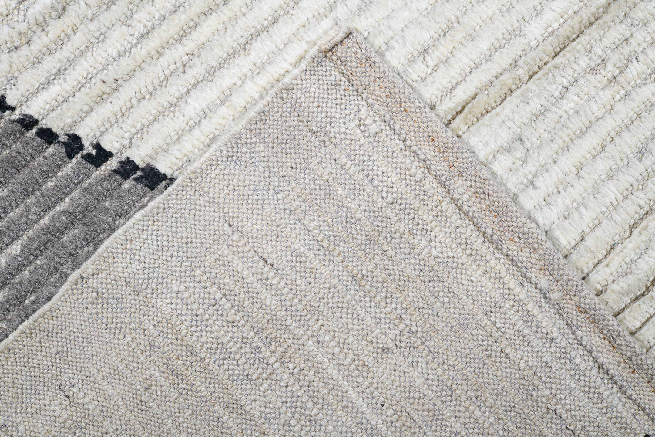 13' x 16' one-of-a-kind handmade vintage Tulu oversize rug. Color palette: ivory, gray, charcoal, black