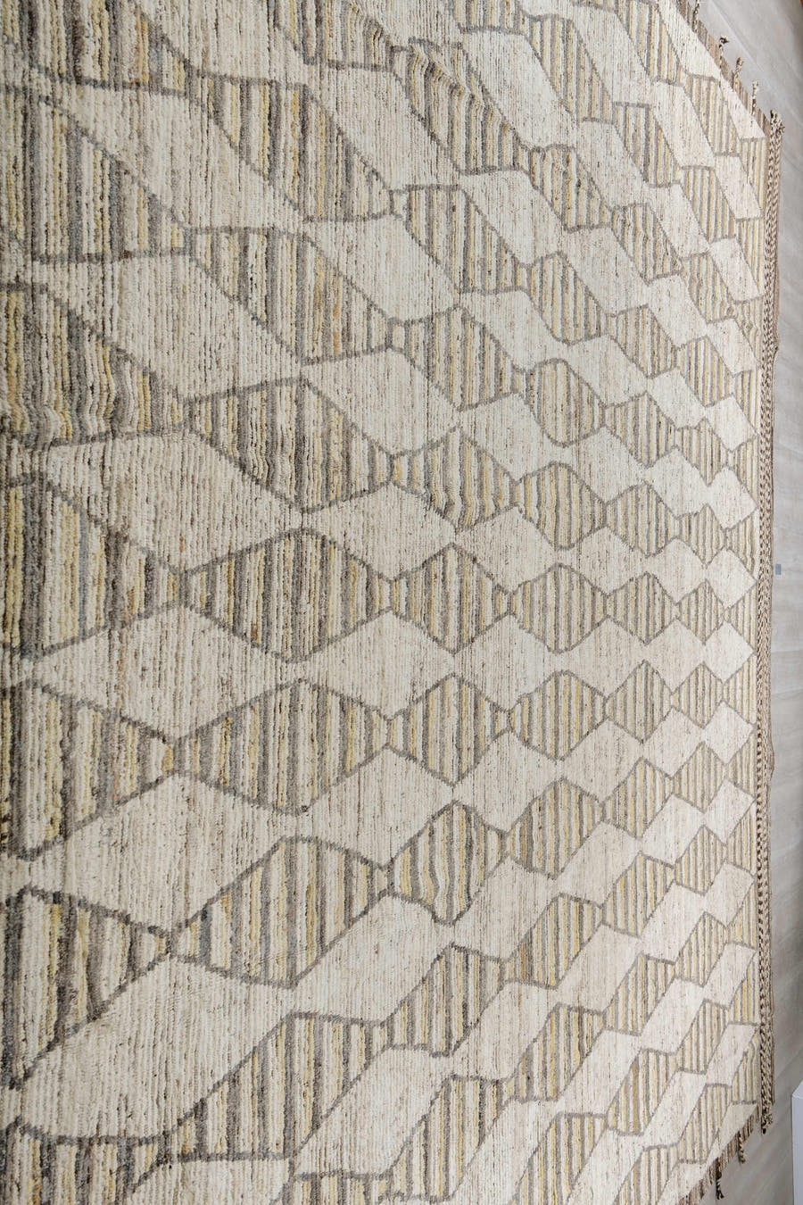 13' x 16' one-of-a-kind handmade vintage Tulu oversize rug. Color palette: ivory, taupe, brown, pale gold, charcoal, beige