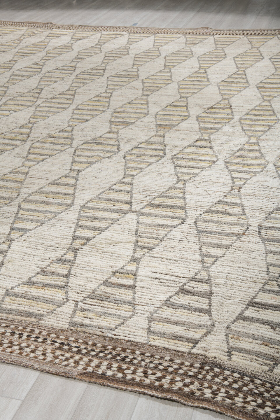 13' x 16' one-of-a-kind handmade vintage Tulu oversize rug. Color palette: ivory, taupe, brown, pale gold, charcoal, beige