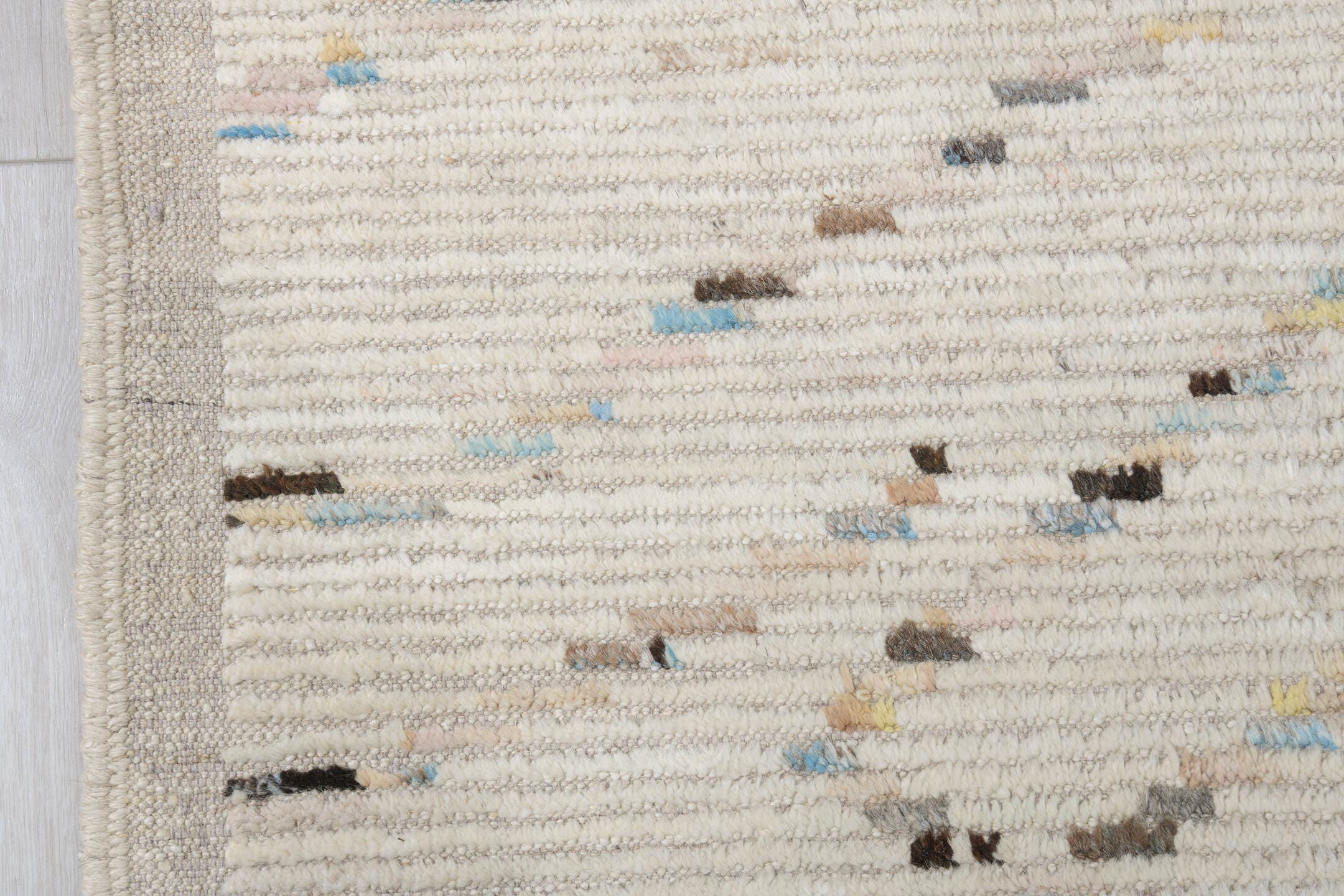 10' x 13' one-of-a-kind handmade vintage Tulu large size rug. Color palette: ivory, cream, charcoal, pale blue, taupe, beige