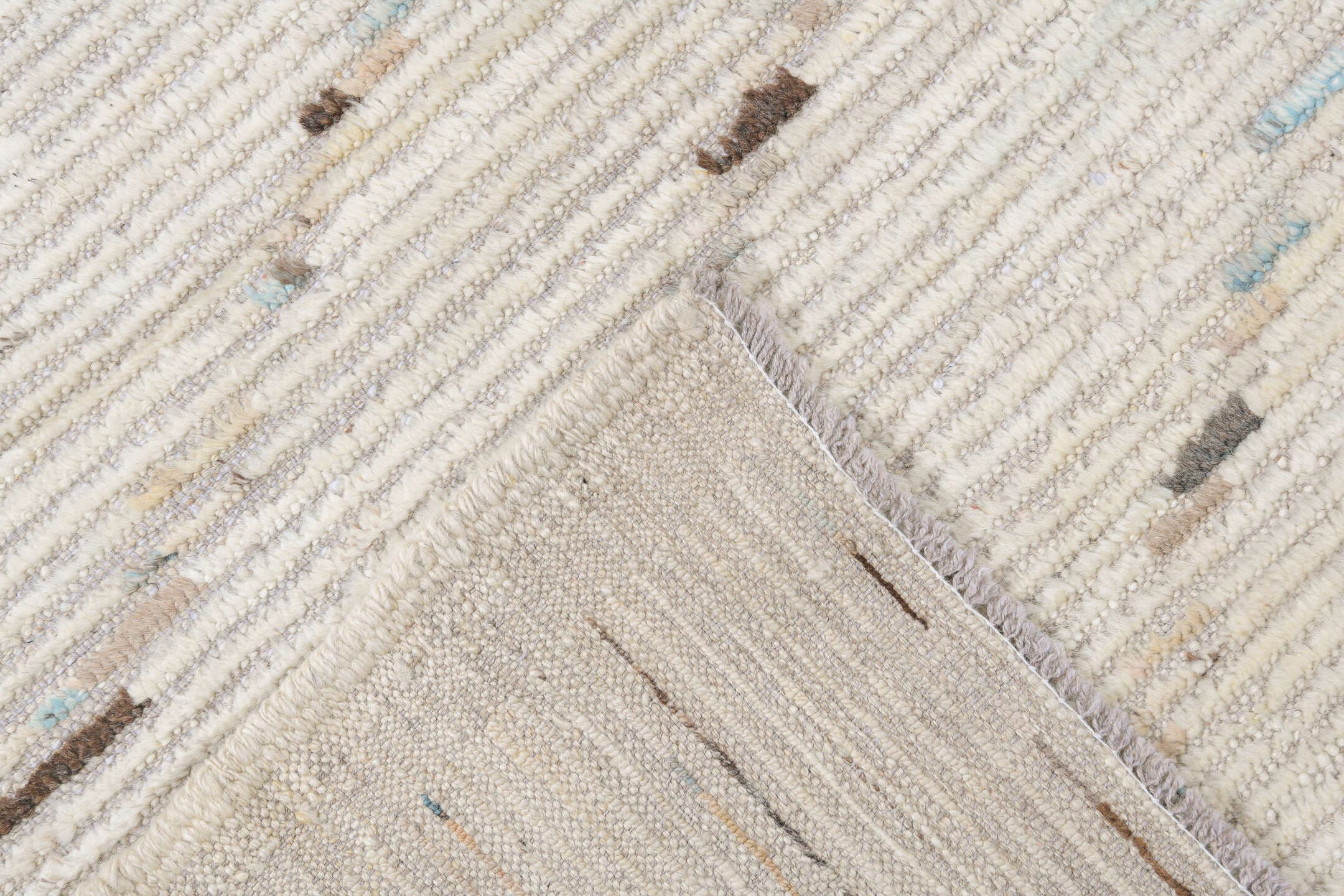 10' x 13' one-of-a-kind handmade vintage Tulu large size rug. Color palette: ivory, cream, charcoal, pale blue, taupe, beige