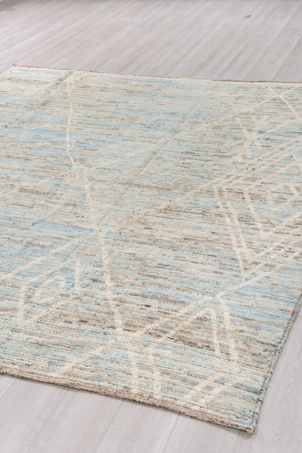 8' x 9' one-of-a-kind handmade vintage Tulu rug. Color palette: ivory, taupe, pale blue, beige, gray, cream, light blue