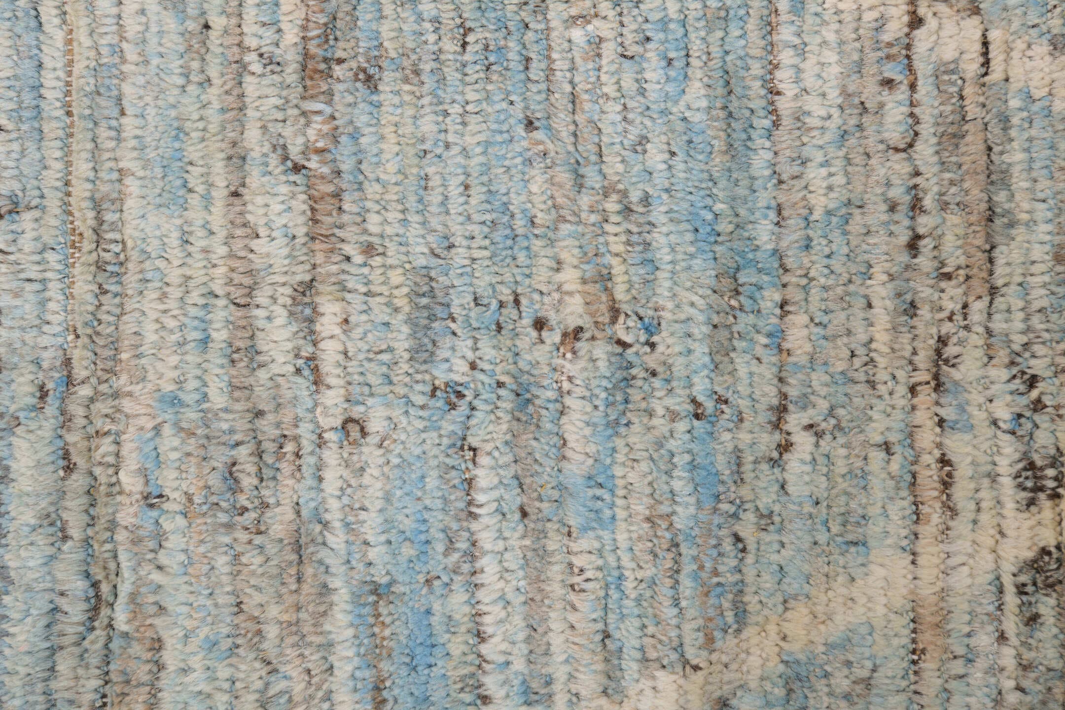 8' x 9' one-of-a-kind handmade vintage Tulu rug. Color palette: ivory, taupe, pale blue, beige, gray, cream, light blue