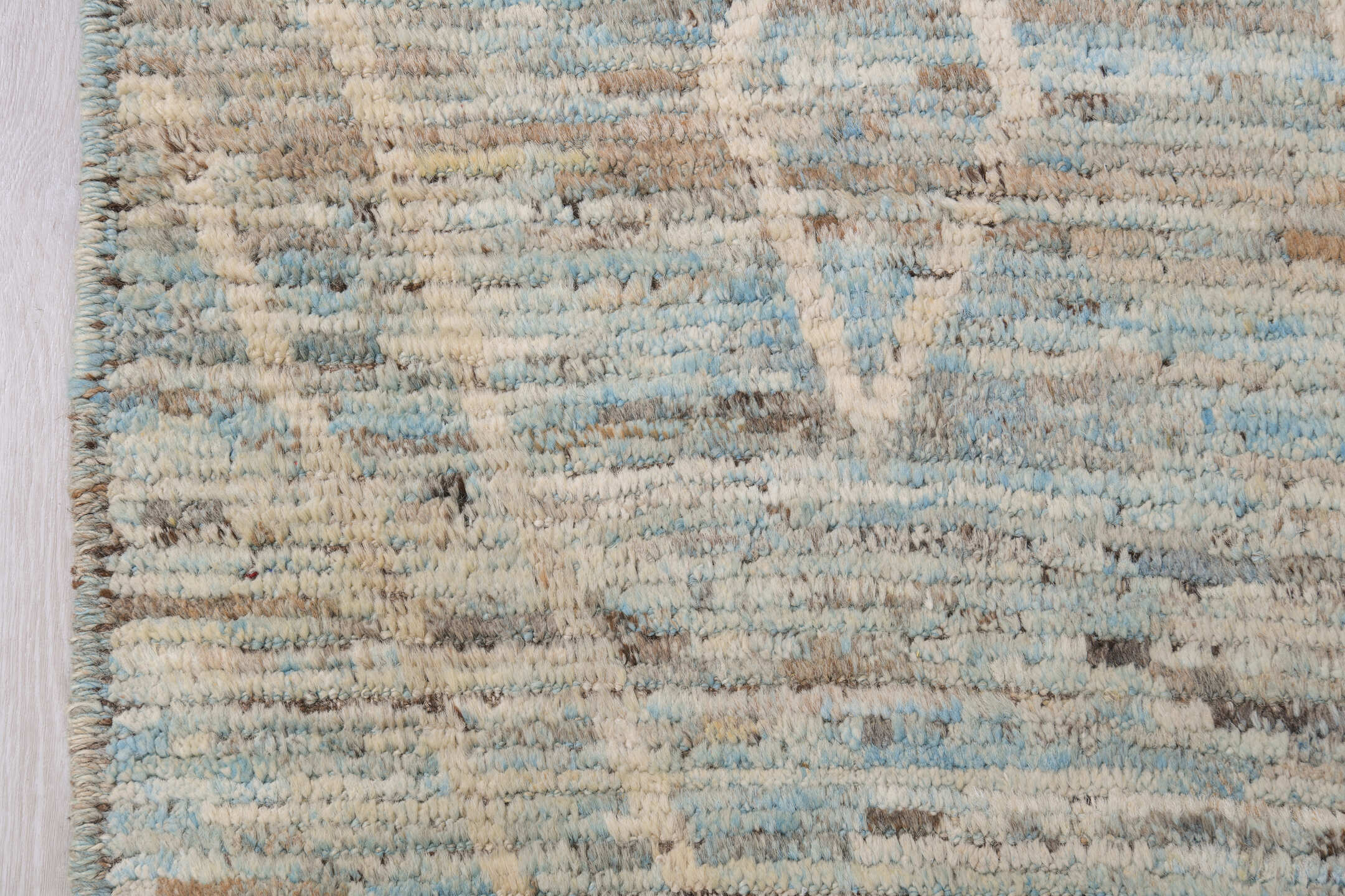 8' x 9' one-of-a-kind handmade vintage Tulu rug. Color palette: ivory, taupe, pale blue, beige, gray, cream, light blue