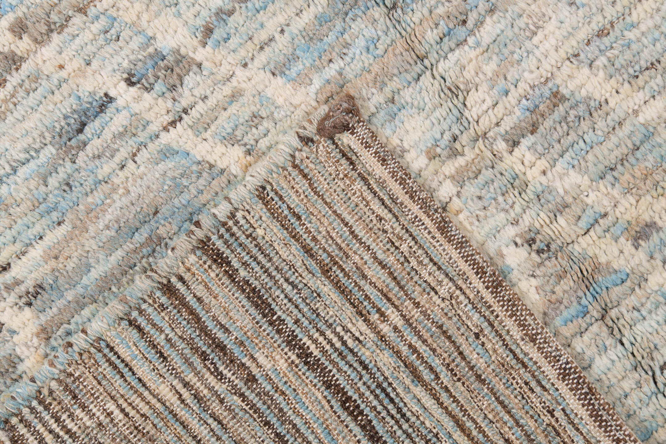 8' x 9' one-of-a-kind handmade vintage Tulu rug. Color palette: ivory, taupe, pale blue, beige, gray, cream, light blue