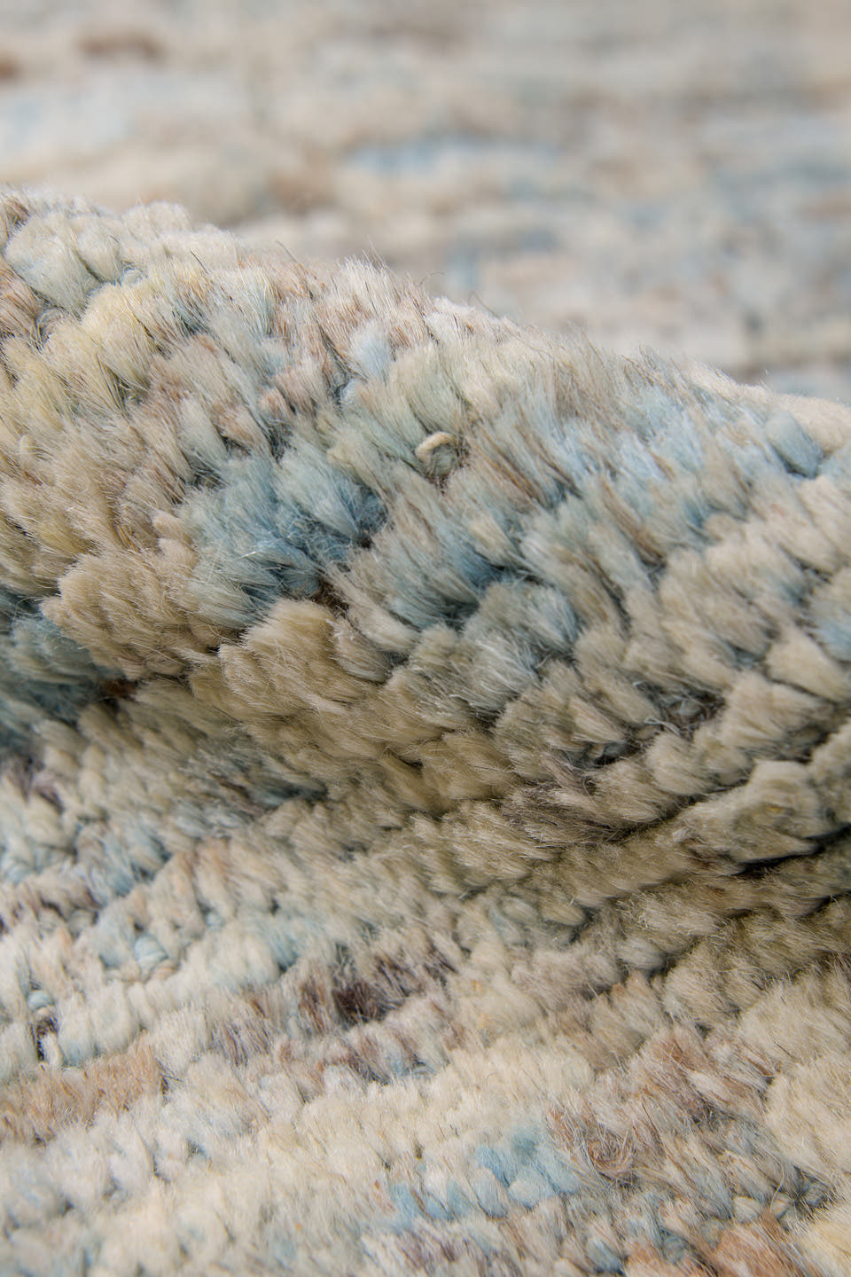 8' x 9' one-of-a-kind handmade vintage Tulu rug. Color palette: ivory, taupe, pale blue, beige, gray, cream, light blue