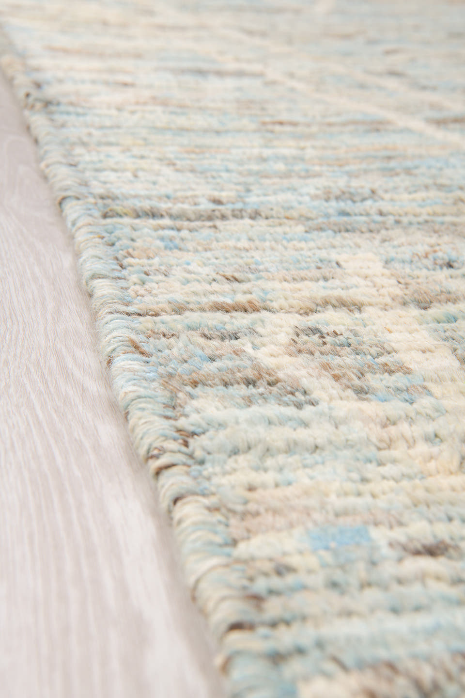 8' x 9' one-of-a-kind handmade vintage Tulu rug. Color palette: ivory, taupe, pale blue, beige, gray, cream, light blue