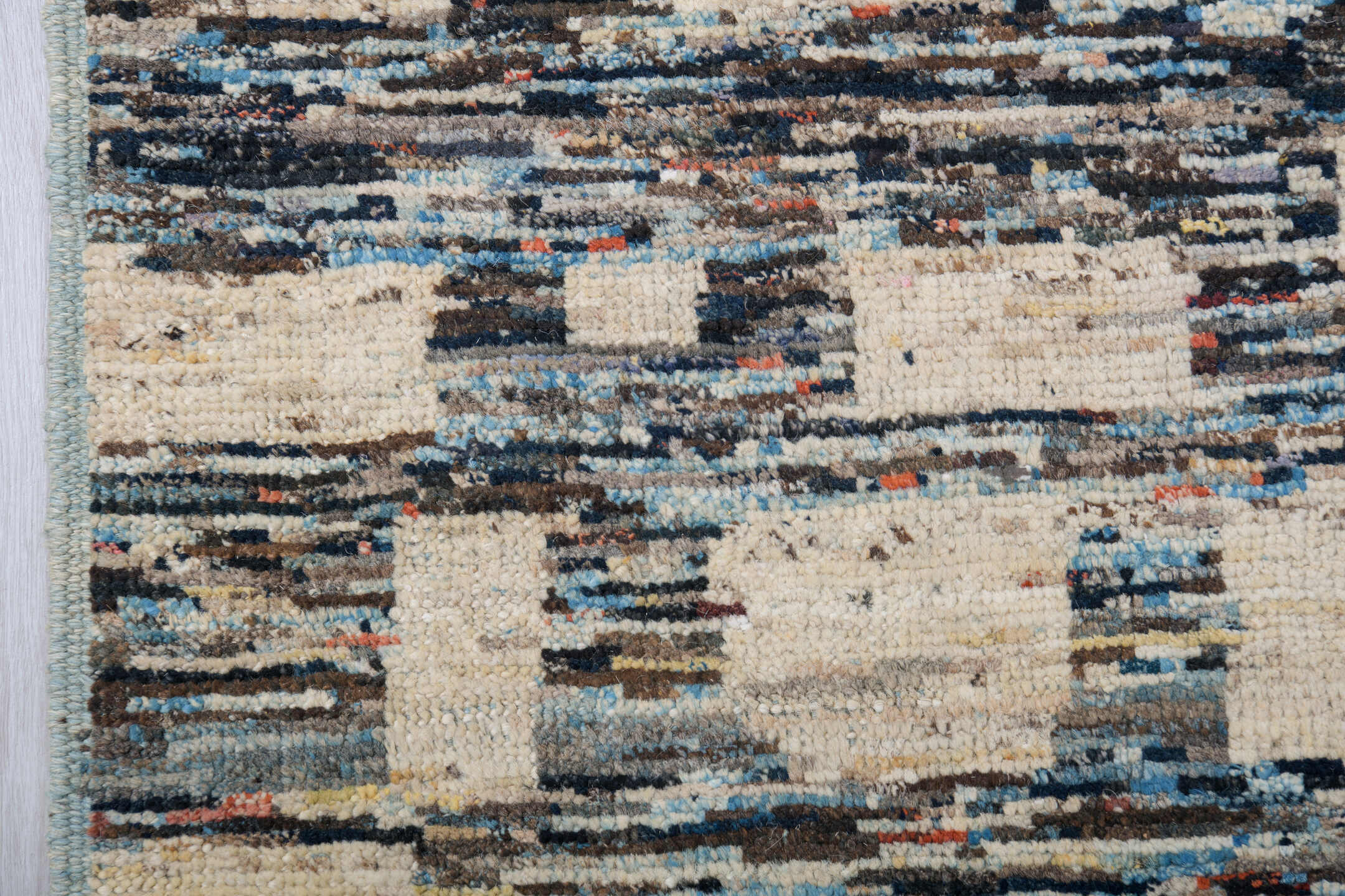 9' x 12' one-of-a-kind handmade vintage Tulu large size rug. Color palette: gray, ivory, charcoal, sky blue, cream, black
