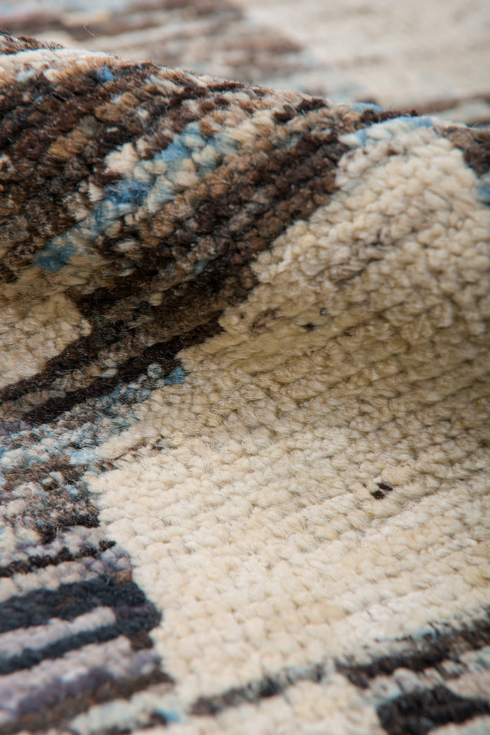 9' x 12' one-of-a-kind handmade vintage Tulu large size rug. Color palette: gray, ivory, charcoal, sky blue, cream, black