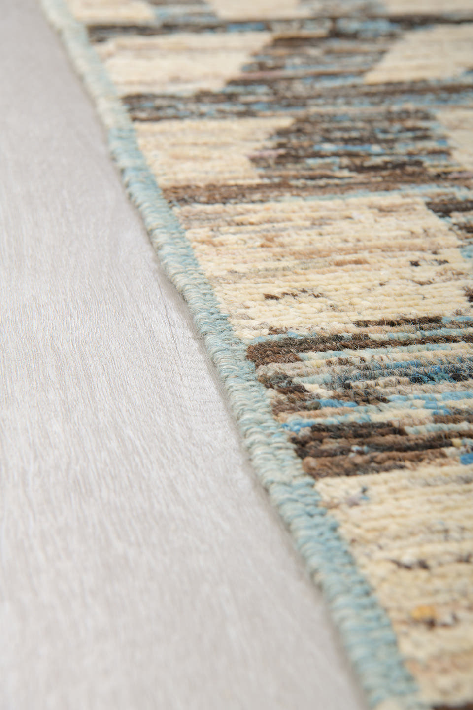 9' x 12' one-of-a-kind handmade vintage Tulu large size rug. Color palette: gray, ivory, charcoal, sky blue, cream, black