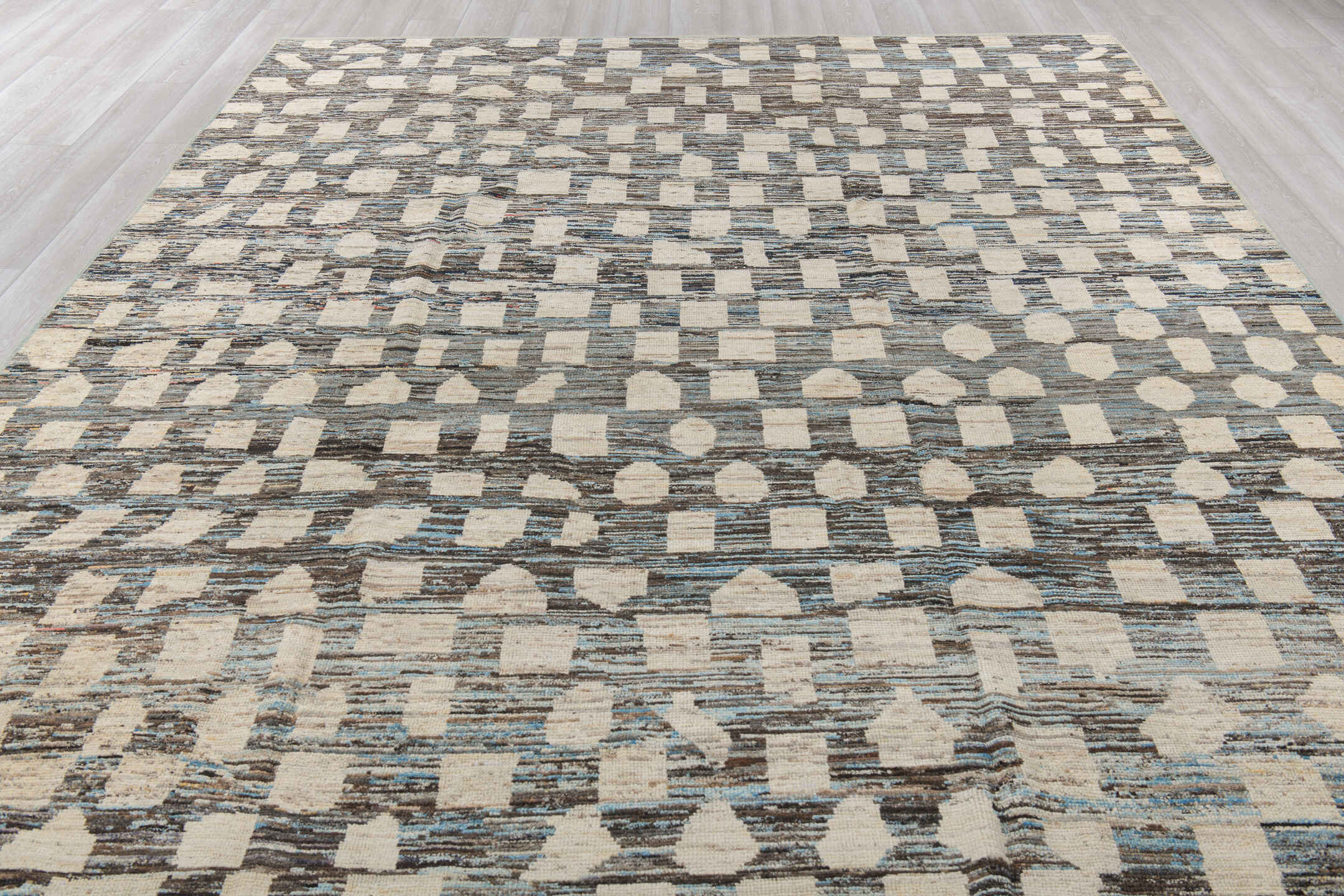 9' x 12' one-of-a-kind handmade vintage Tulu large size rug. Color palette: gray, ivory, charcoal, sky blue, cream, black