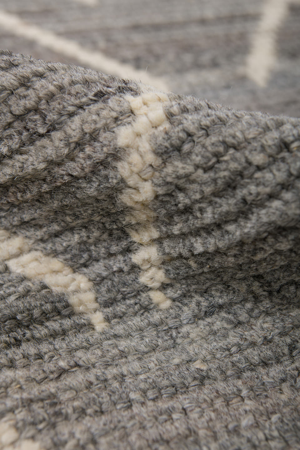 6' x 9' one-of-a-kind handmade vintage Tulu medium size rug. Color palette: gray, ivory, taupe, charcoal, beige, black