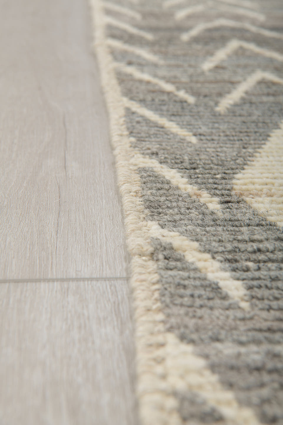 6' x 9' one-of-a-kind handmade vintage Tulu medium size rug. Color palette: gray, ivory, taupe, charcoal, beige, black