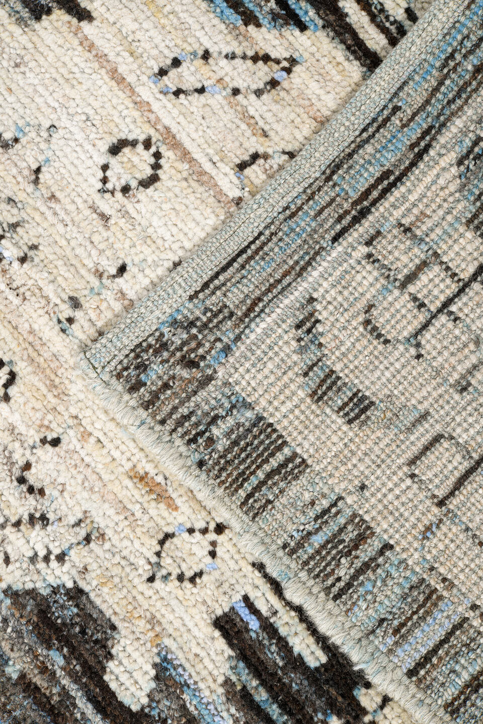 12' x 15' one-of-a-kind handmade vintage Tulu oversize rug. Color palette: charcoal, ivory, slate, blue gray, taupe, black