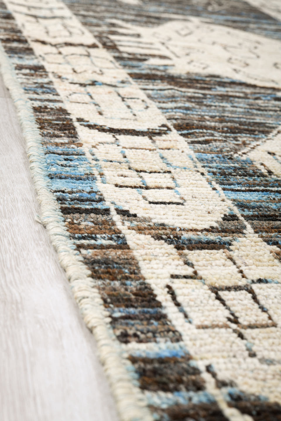 12' x 15' one-of-a-kind handmade vintage Tulu oversize rug. Color palette: charcoal, ivory, slate, blue gray, taupe, black
