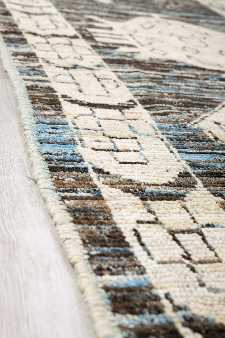 12' x 15' one-of-a-kind handmade vintage Tulu oversize rug. Color palette: charcoal, ivory, slate, blue gray, taupe, black