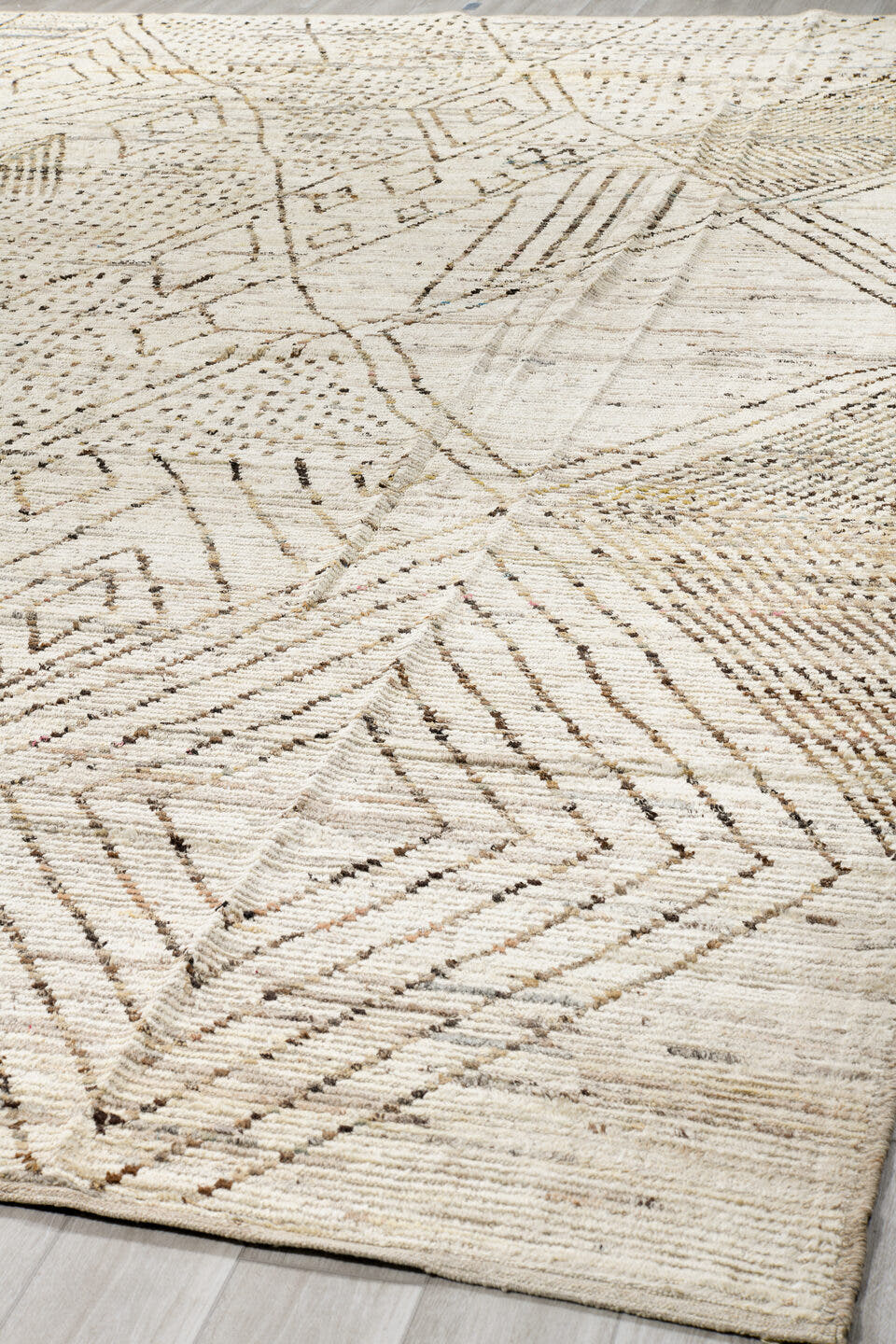 12' x 18' one-of-a-kind handmade vintage Tulu oversize rug. Color palette: ivory, taupe, brown, camel, beige, gray