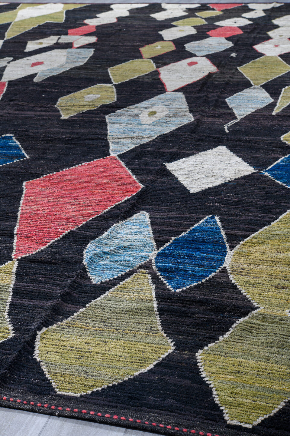 14' x 19' one-of-a-kind handmade vintage Tulu oversize rug. Color palette: charcoal, ivory, olive, sky_blue, coral, navy