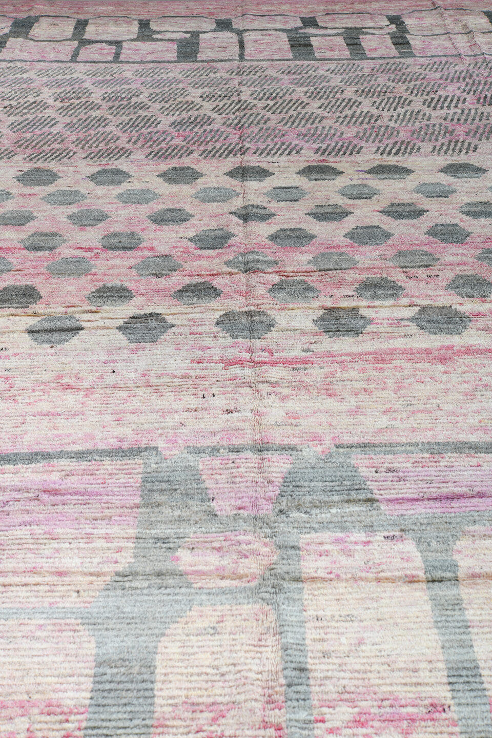 14' x 19' one-of-a-kind handmade vintage Tulu oversize rug. Color palette: pink, ivory, gray, rose, taupe, red, beige