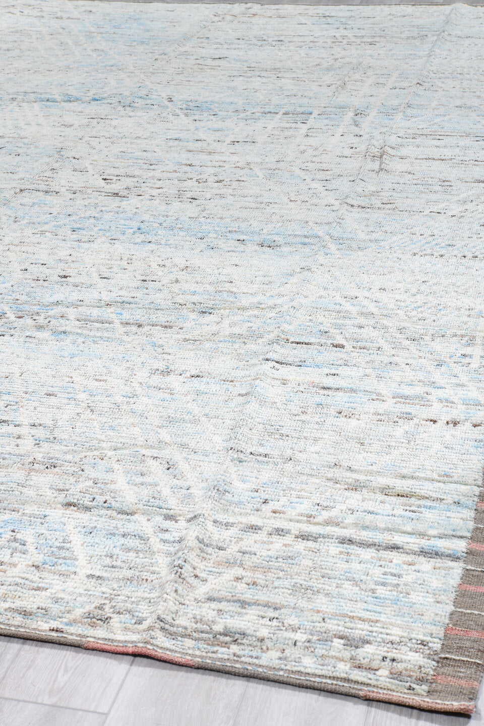 10' x 13' one-of-a-kind handmade vintage Tulu large size rug. Color palette: ivory, pale blue, taupe, light gray, camel