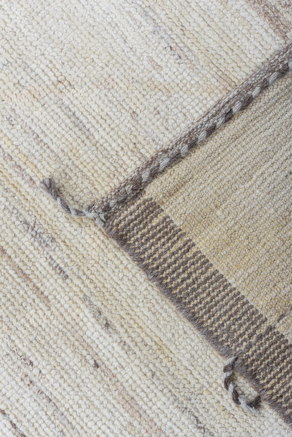10' x 14' one-of-a-kind handmade vintage Tulu large size rug. Color palette: ivory, taupe, apricot, pale blue, butter yellow