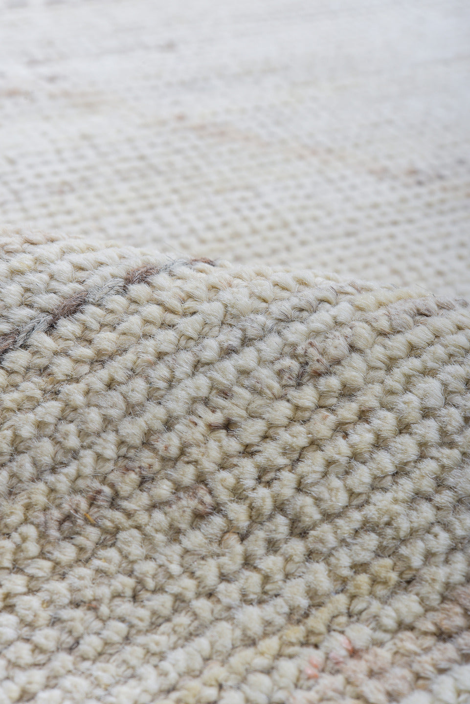 10' x 14' one-of-a-kind handmade vintage Tulu large size rug. Color palette: ivory, taupe, apricot, pale blue, butter yellow