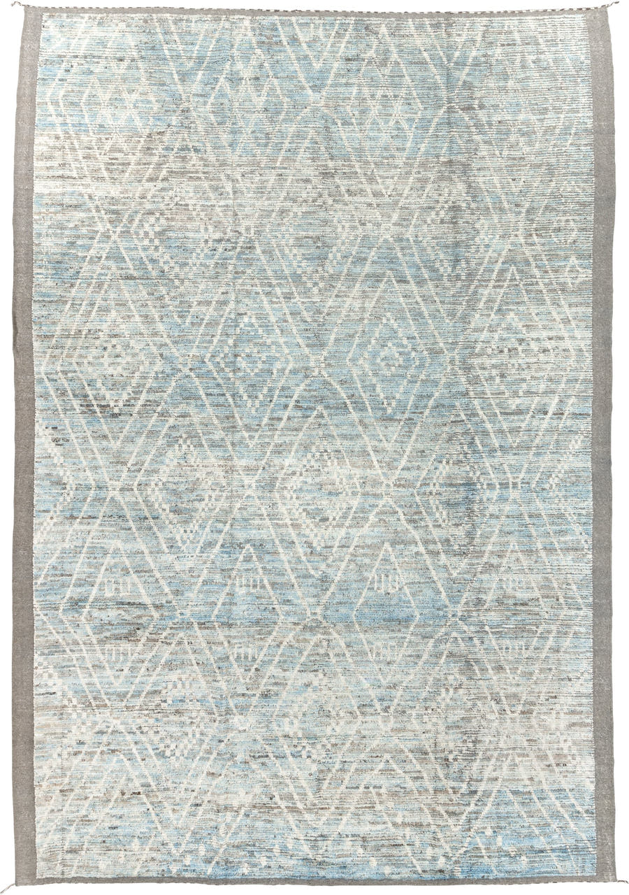 9' x 14' one-of-a-kind handmade vintage Tulu large size rug. Color palette: ivory, ice blue, taupe, silver gray, pale blue