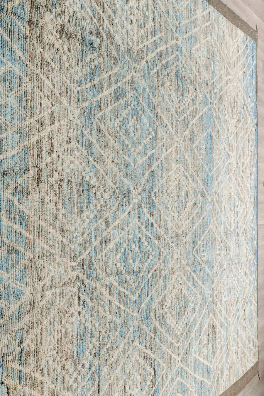9' x 14' one-of-a-kind handmade vintage Tulu large size rug. Color palette: ivory, ice blue, taupe, silver gray, pale blue