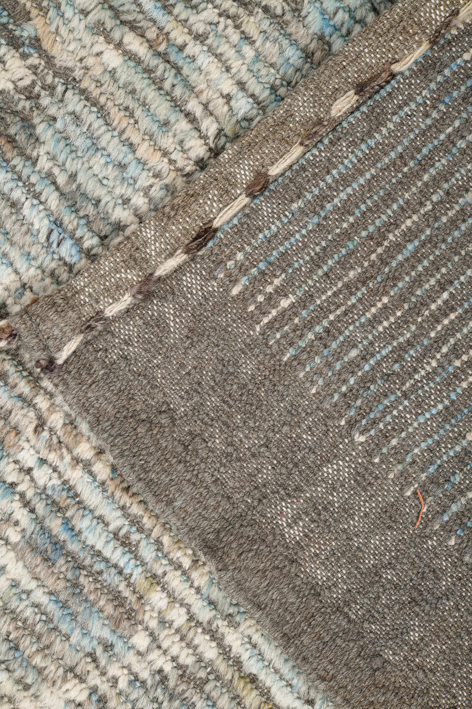 9' x 14' one-of-a-kind handmade vintage Tulu large size rug. Color palette: ivory, ice blue, taupe, silver gray, pale blue
