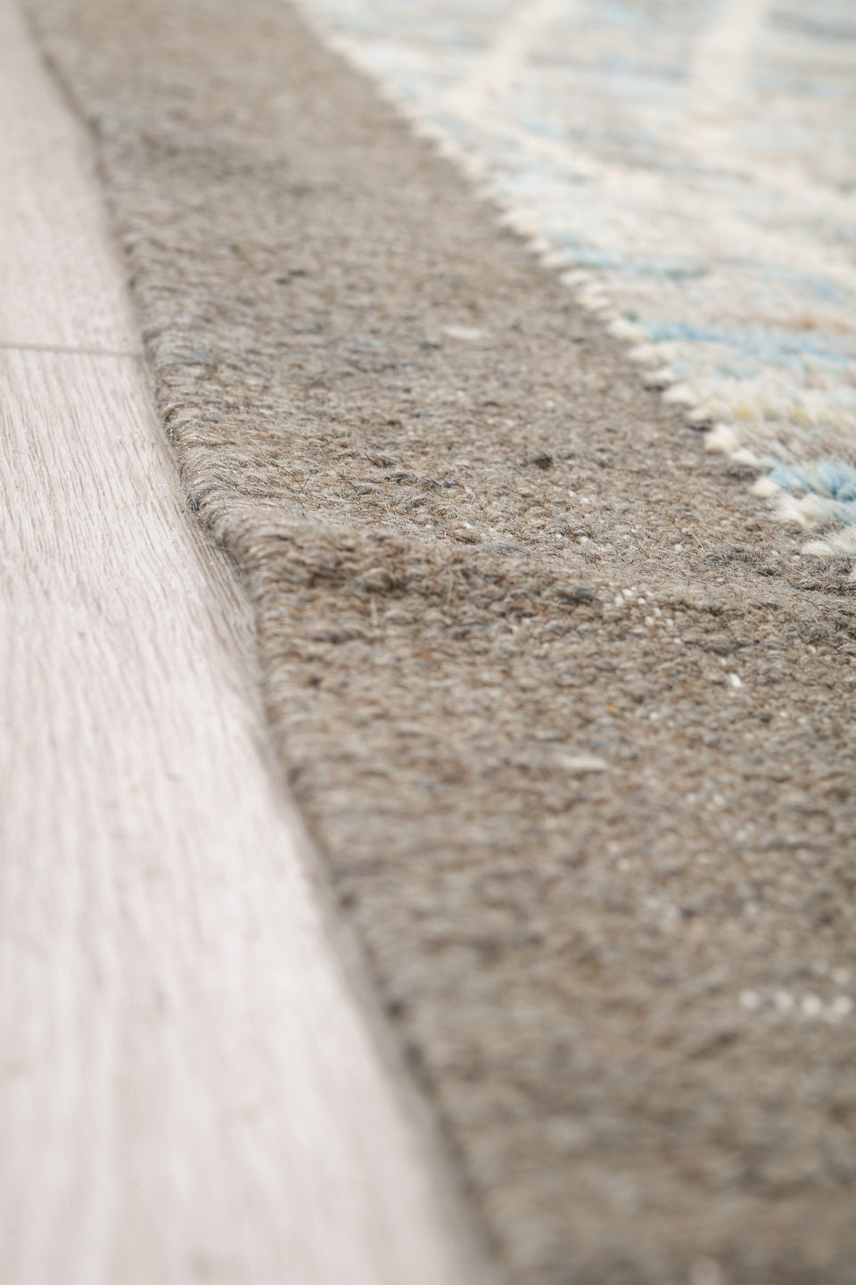 9' x 14' one-of-a-kind handmade vintage Tulu large size rug. Color palette: ivory, ice blue, taupe, silver gray, pale blue