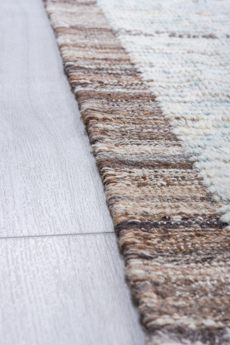 10' x 13' one-of-a-kind handmade vintage Tulu large size rug. Color palette: ivory, pale blue, taupe, brown, gray