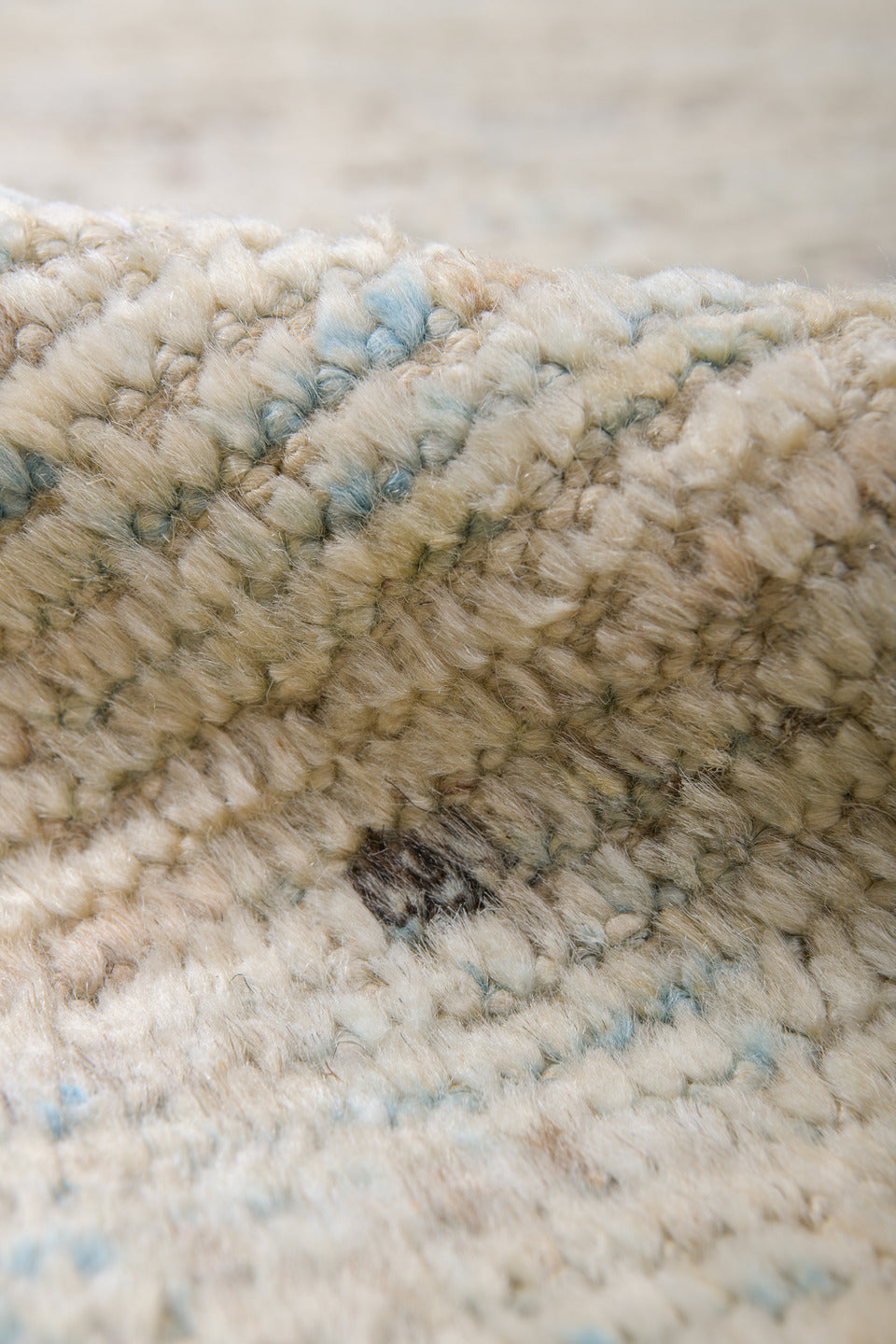9' x 11' one-of-a-kind handmade vintage Tulu large size rug. Color palette: ivory, cream, taupe, pale blue, brown, gray