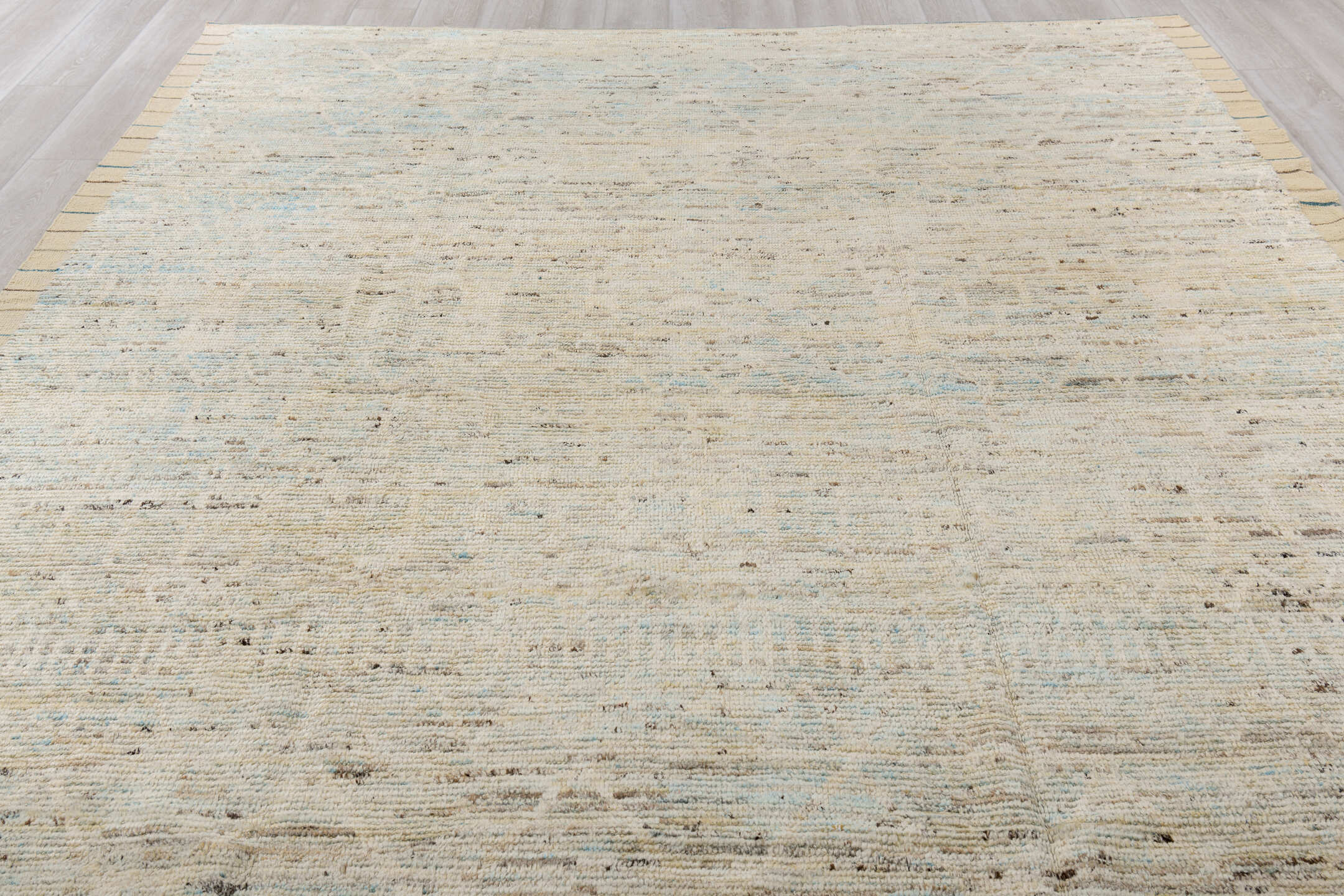9' x 11' one-of-a-kind handmade vintage Tulu large size rug. Color palette: ivory, cream, taupe, pale blue, brown, gray