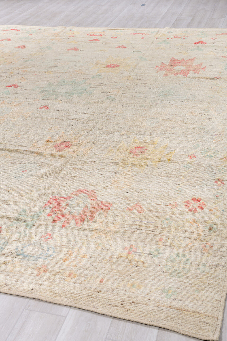 10' x 13' one-of-a-kind handmade vintage Tulu large size rug. Color palette: ivory, blush, pale sage, saffron, beige, pink