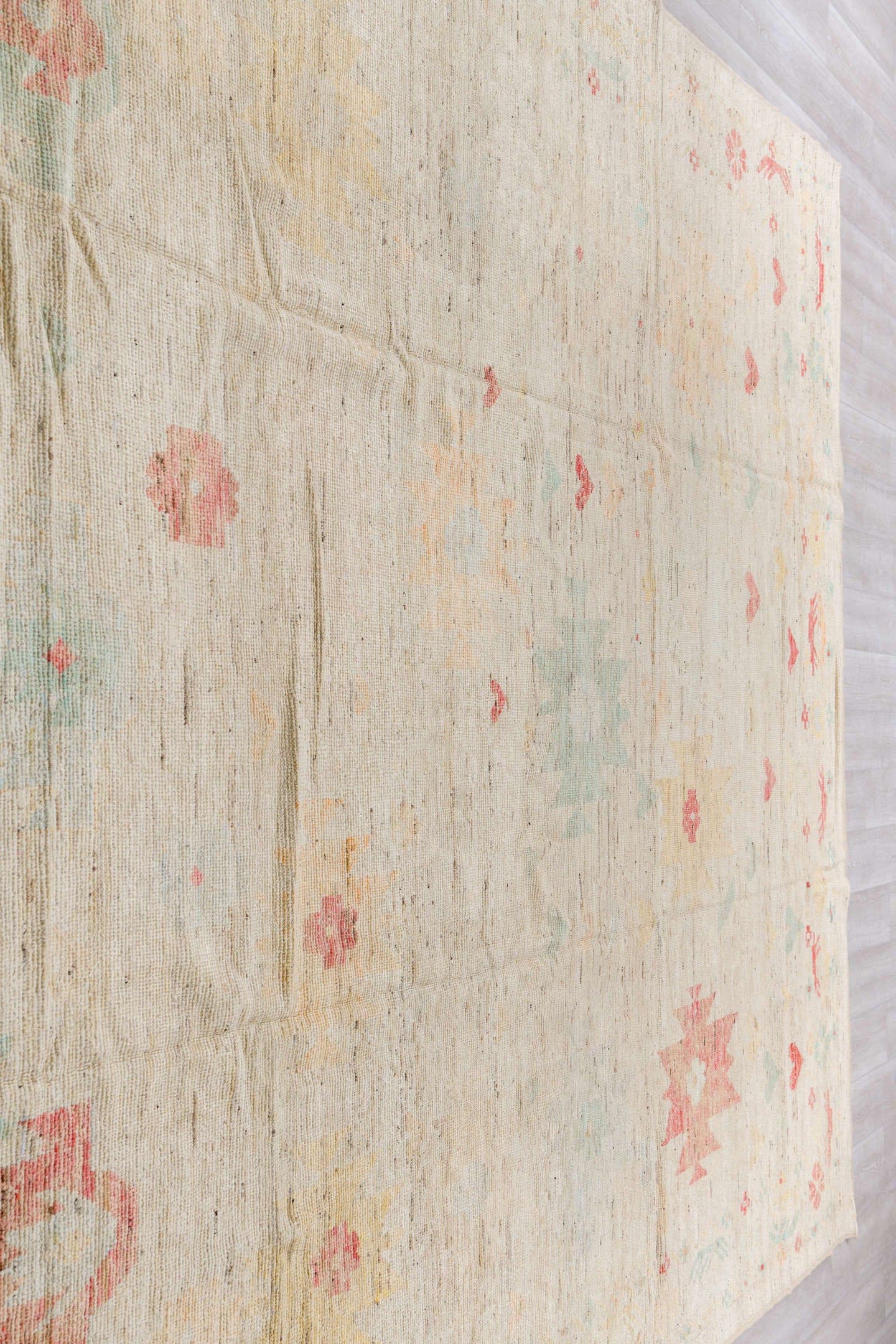 10' x 13' one-of-a-kind handmade vintage Tulu large size rug. Color palette: ivory, blush, pale sage, saffron, beige, pink