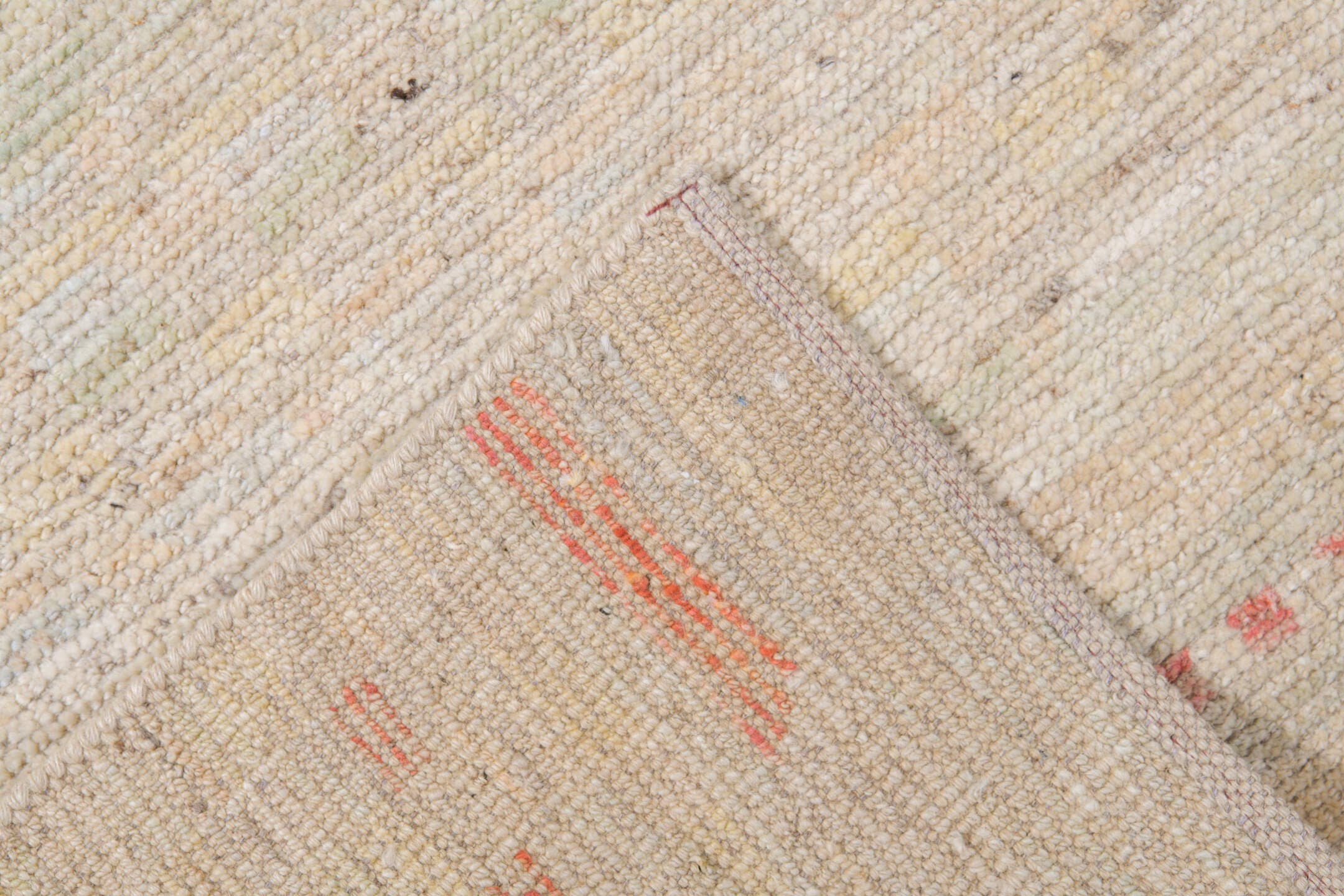 10' x 13' one-of-a-kind handmade vintage Tulu large size rug. Color palette: ivory, cream, blush, coral, pale sage, sand