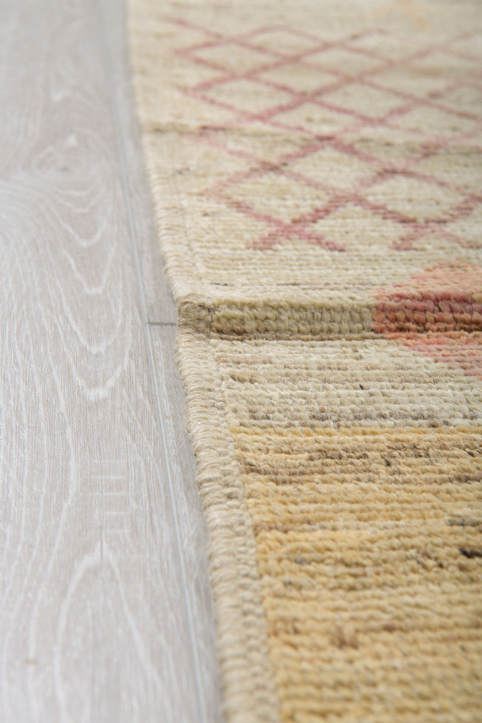 13' x 19' one-of-a-kind handmade vintage Tulu oversize rug. Color palette: ivory, blush, pale blue, saffron, coral, taupe