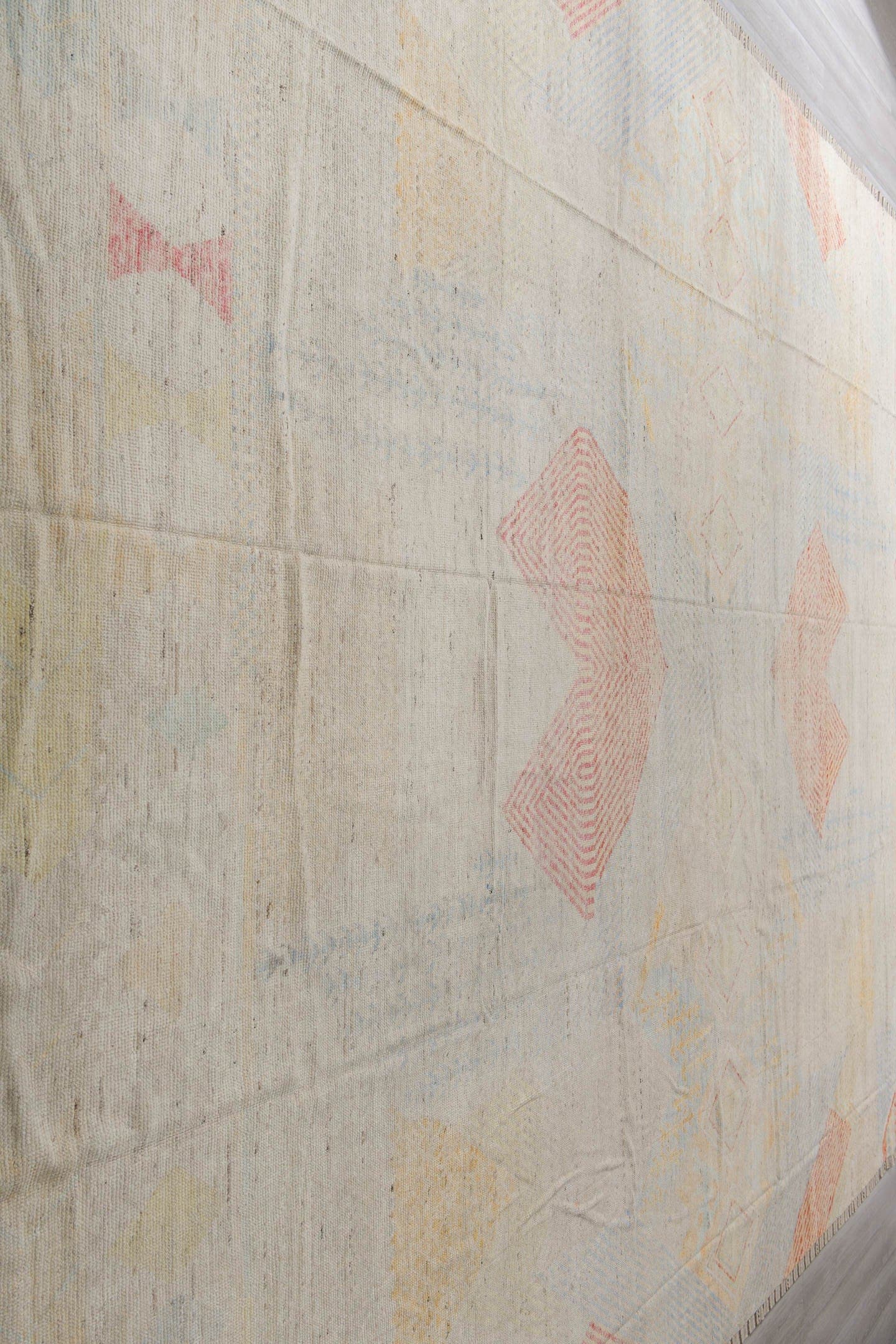 13' x 19' one-of-a-kind handmade vintage Tulu oversize rug. Color palette: ivory, pale blue, coral, soft gold, cream