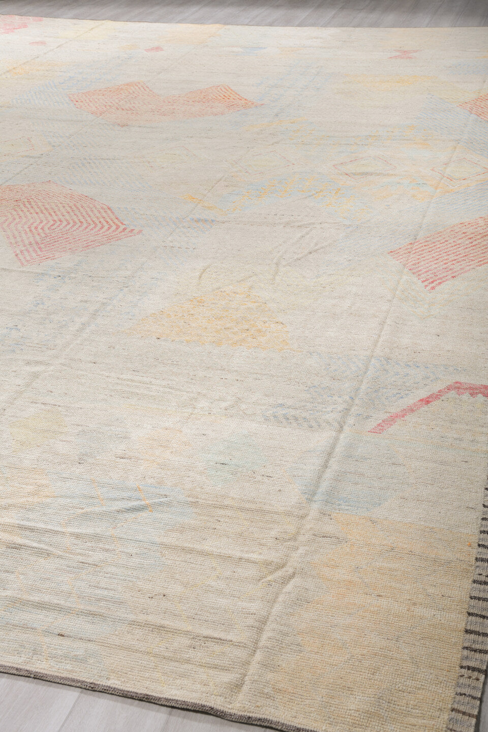 13' x 19' one-of-a-kind handmade vintage Tulu oversize rug. Color palette: ivory, pale blue, coral, soft gold, cream