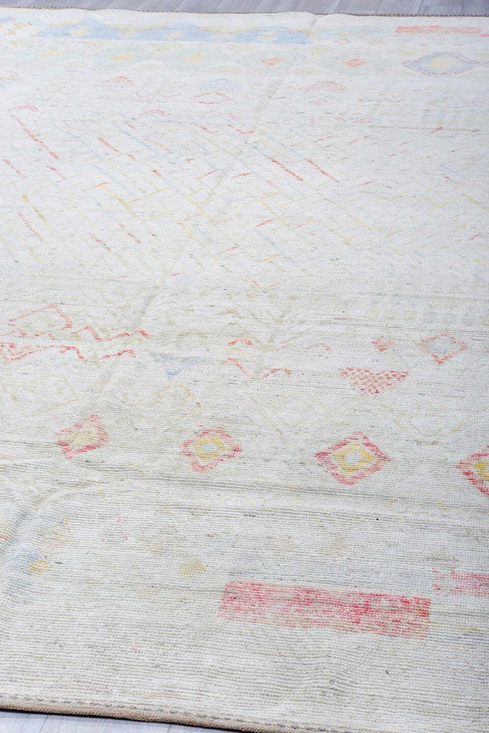 10' x 13' one-of-a-kind handmade vintage Tulu large size rug. Color palette: ivory, powder_blue, blush, saffron, cream