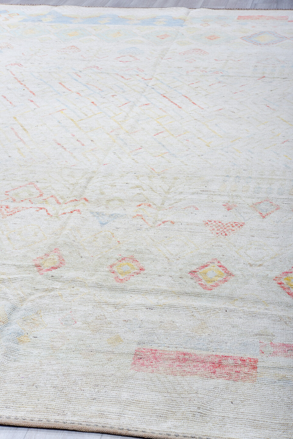 10' x 13' one-of-a-kind handmade vintage Tulu large size rug. Color palette: ivory, powder_blue, blush, saffron, cream