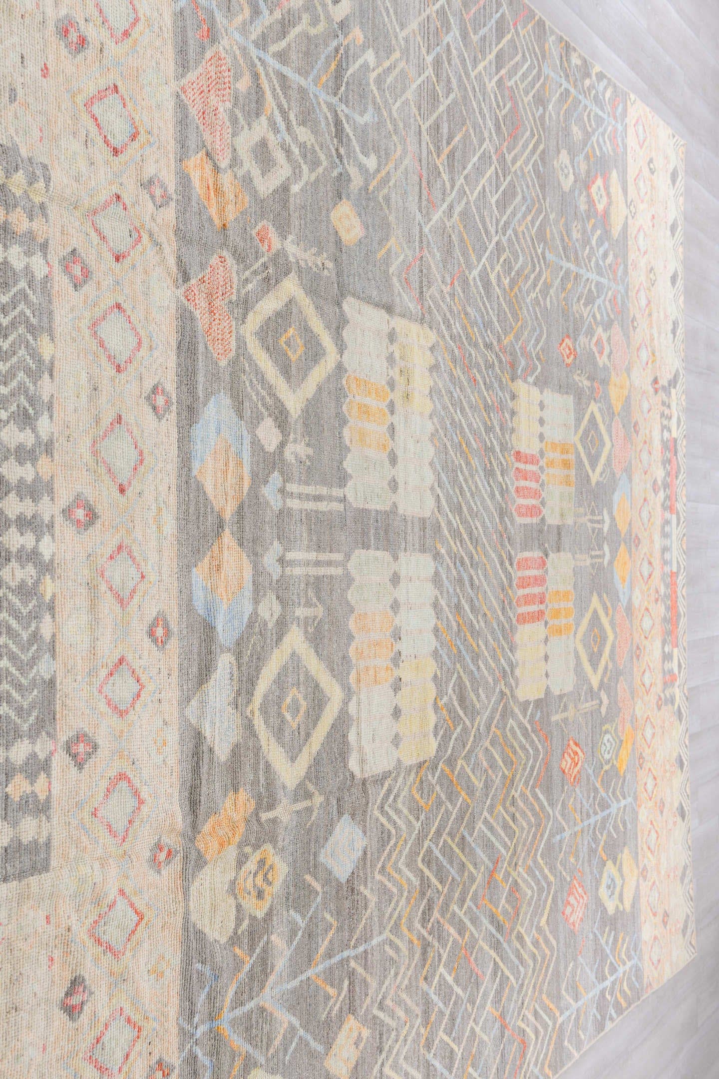 10' x 13' one-of-a-kind handmade vintage Tulu large size rug. Color palette: gray, ivory, cream, coral, saffron, pale_blue