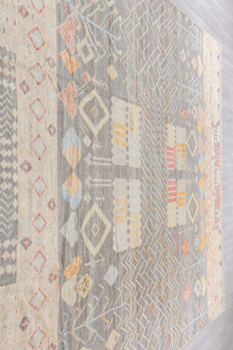 10' x 13' one-of-a-kind handmade vintage Tulu large size rug. Color palette: gray, ivory, cream, coral, saffron, pale_blue