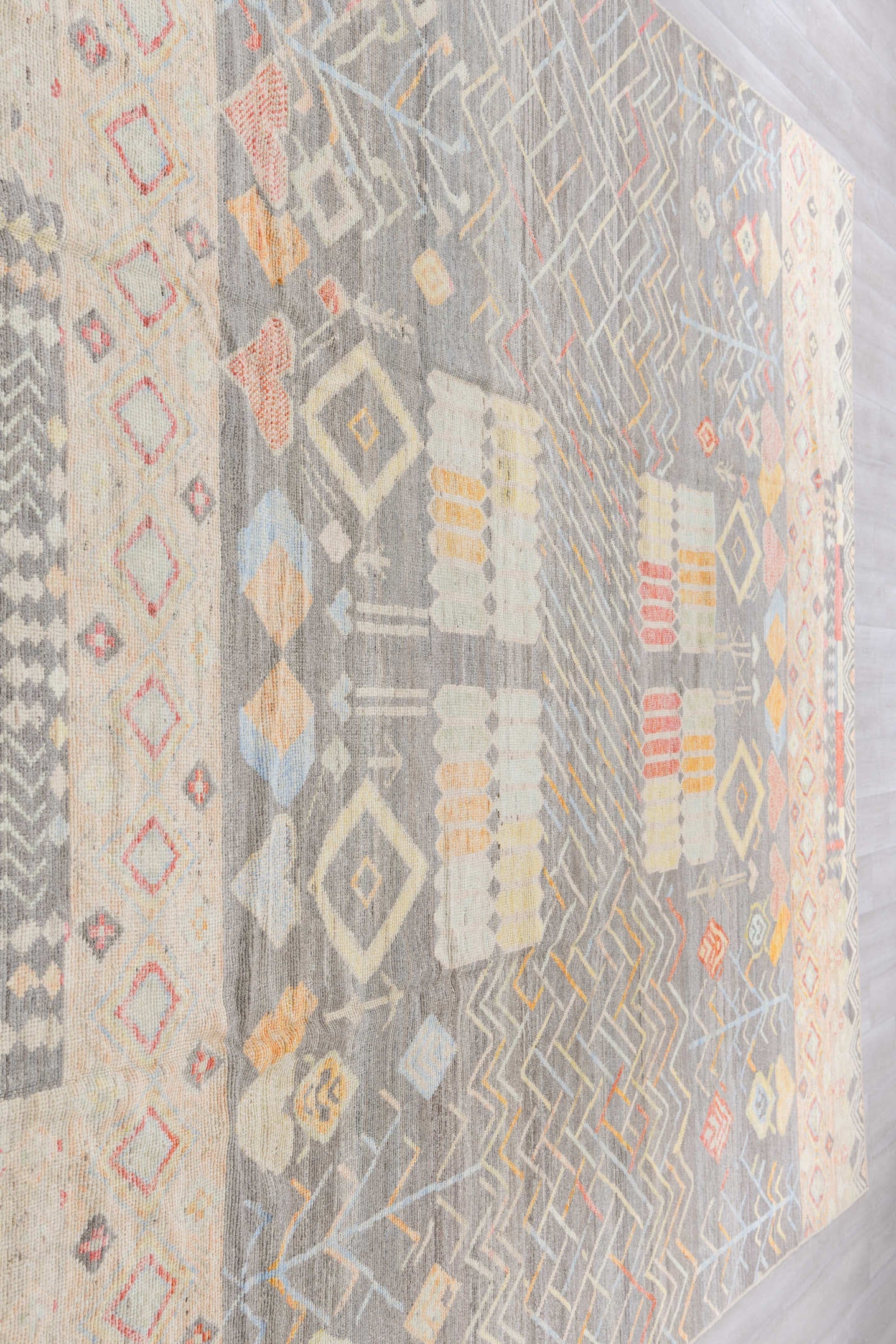 10' x 13' one-of-a-kind handmade vintage Tulu large size rug. Color palette: gray, ivory, cream, coral, saffron, pale_blue