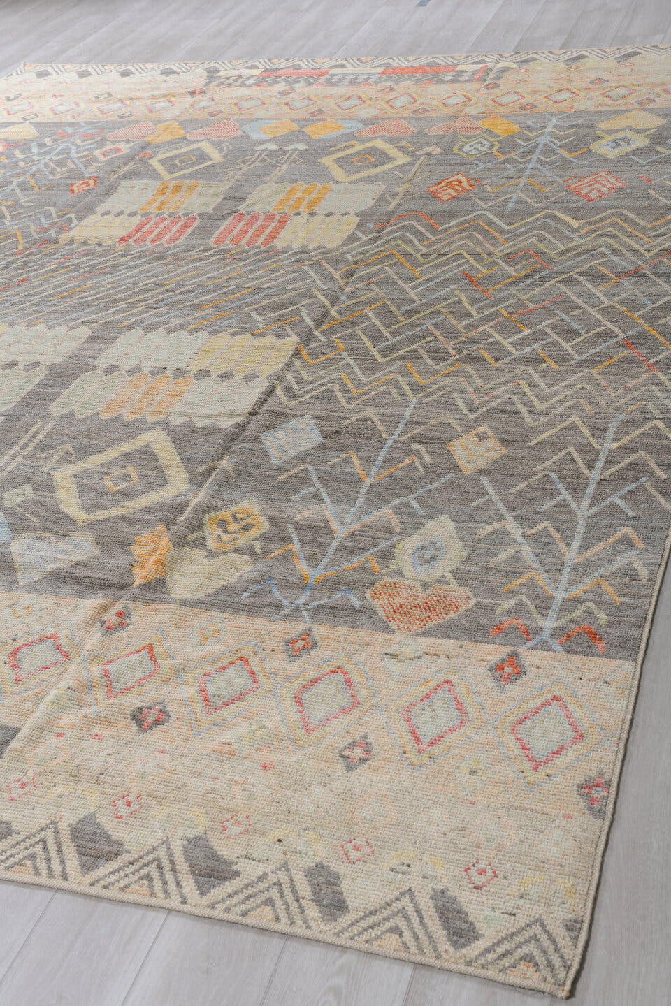 10' x 13' one-of-a-kind handmade vintage Tulu large size rug. Color palette: gray, ivory, cream, coral, saffron, pale_blue