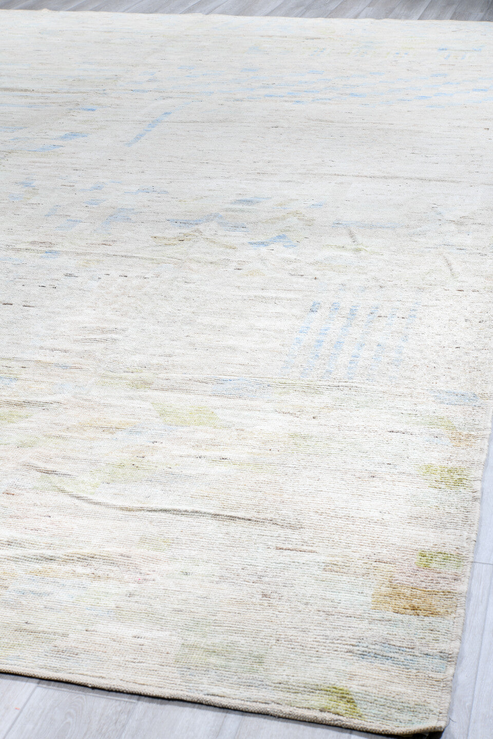 13' x 19' one-of-a-kind handmade vintage Tulu oversize rug. Color palette: ivory, pale blue, cream, celadon, taupe