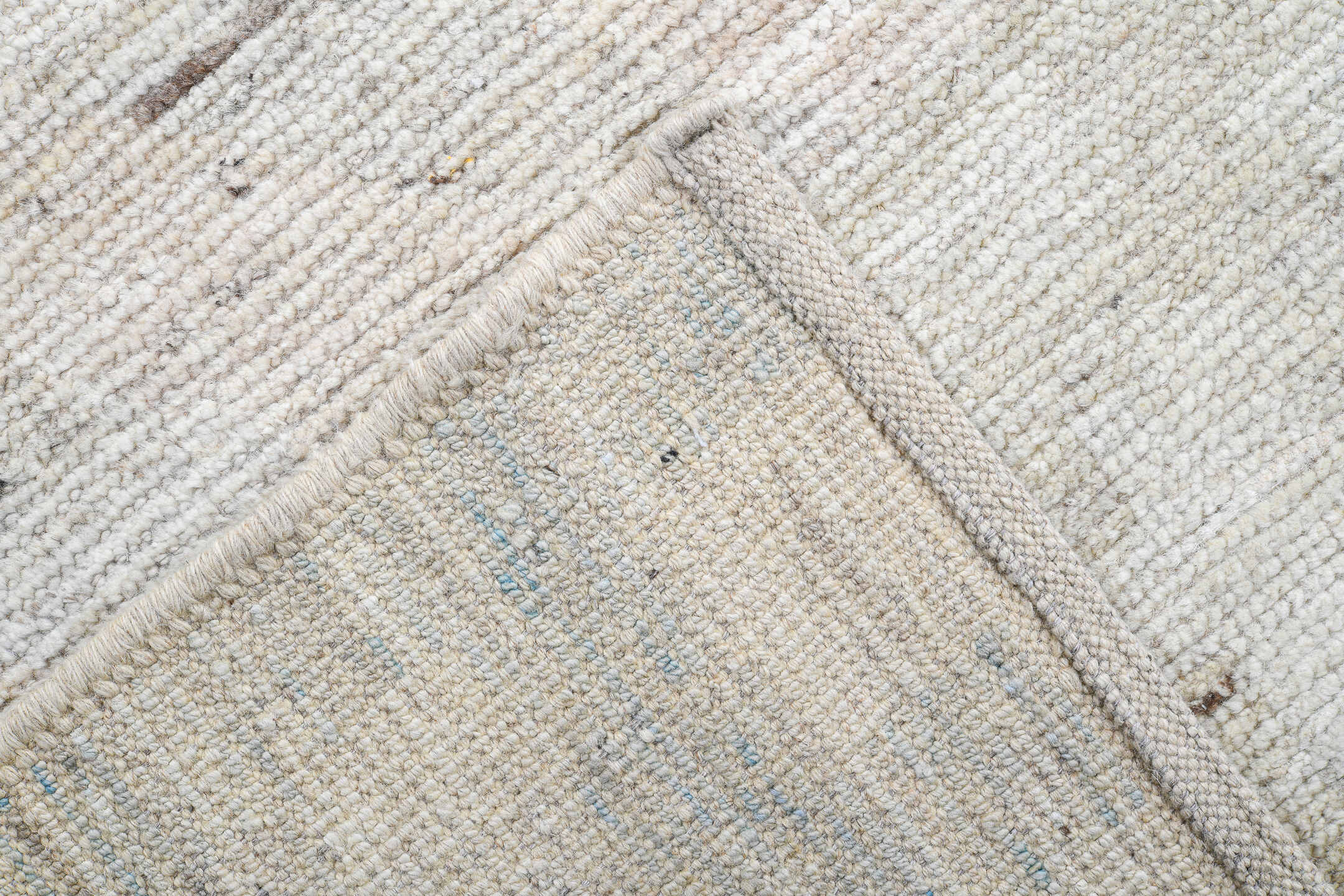 13' x 19' one-of-a-kind handmade vintage Tulu oversize rug. Color palette: ivory, pale blue, cream, celadon, taupe