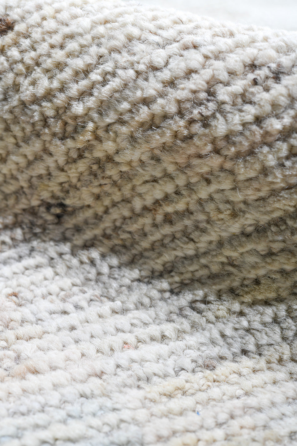 13' x 19' one-of-a-kind handmade vintage Tulu oversize rug. Color palette: ivory, pale blue, cream, celadon, taupe